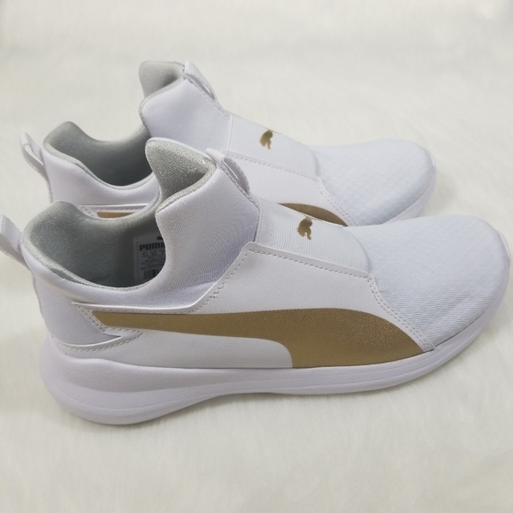 puma rebel mid trainers ladies